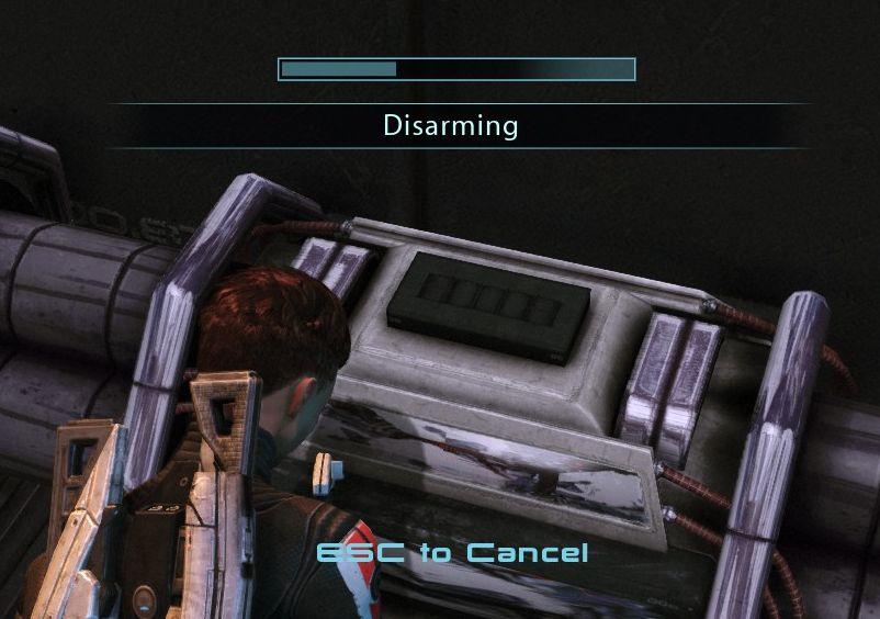 disarming (ESC to cancel) from Mass Effect 1 UI screenshot (English)